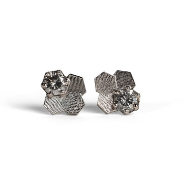 Three Chaos hex studs with salt and pepper diamonds