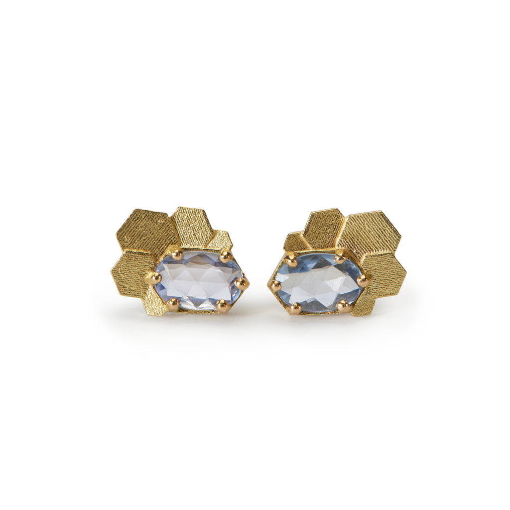 Chaos hex stud earrings with blue oval sapphires