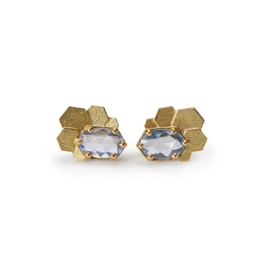 Chaos hex stud earrings with blue oval sapphires