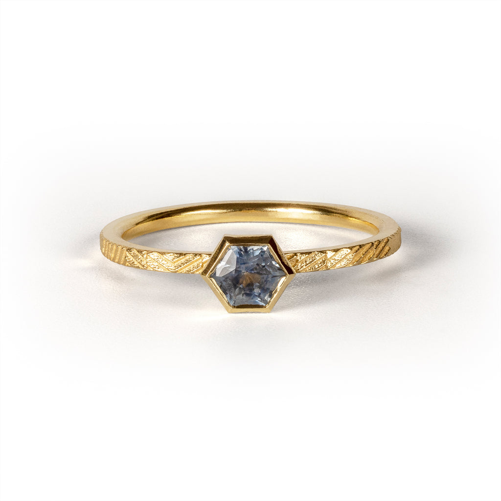 1.5mm Contour ring with hexagonal montana sapphire